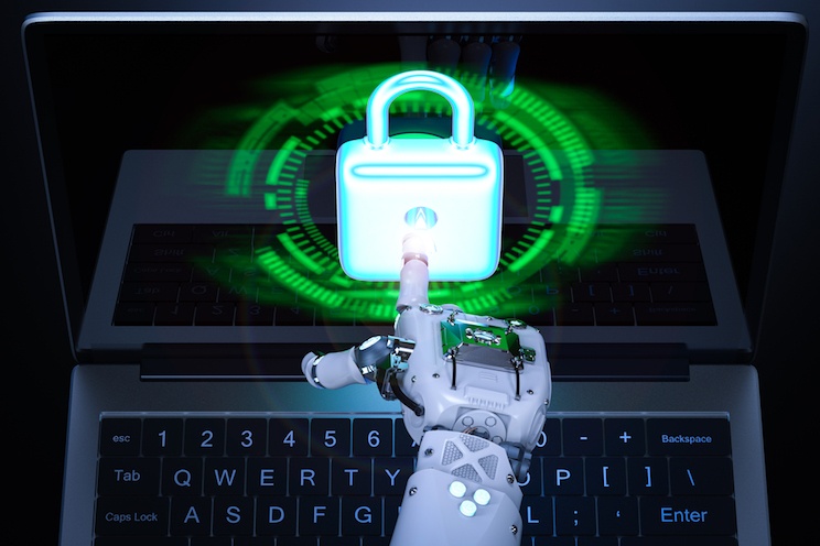 Rendering 3D della mano di un robot che indica un lucchetto posto su un PC, a esprimere concetto di cyber-security